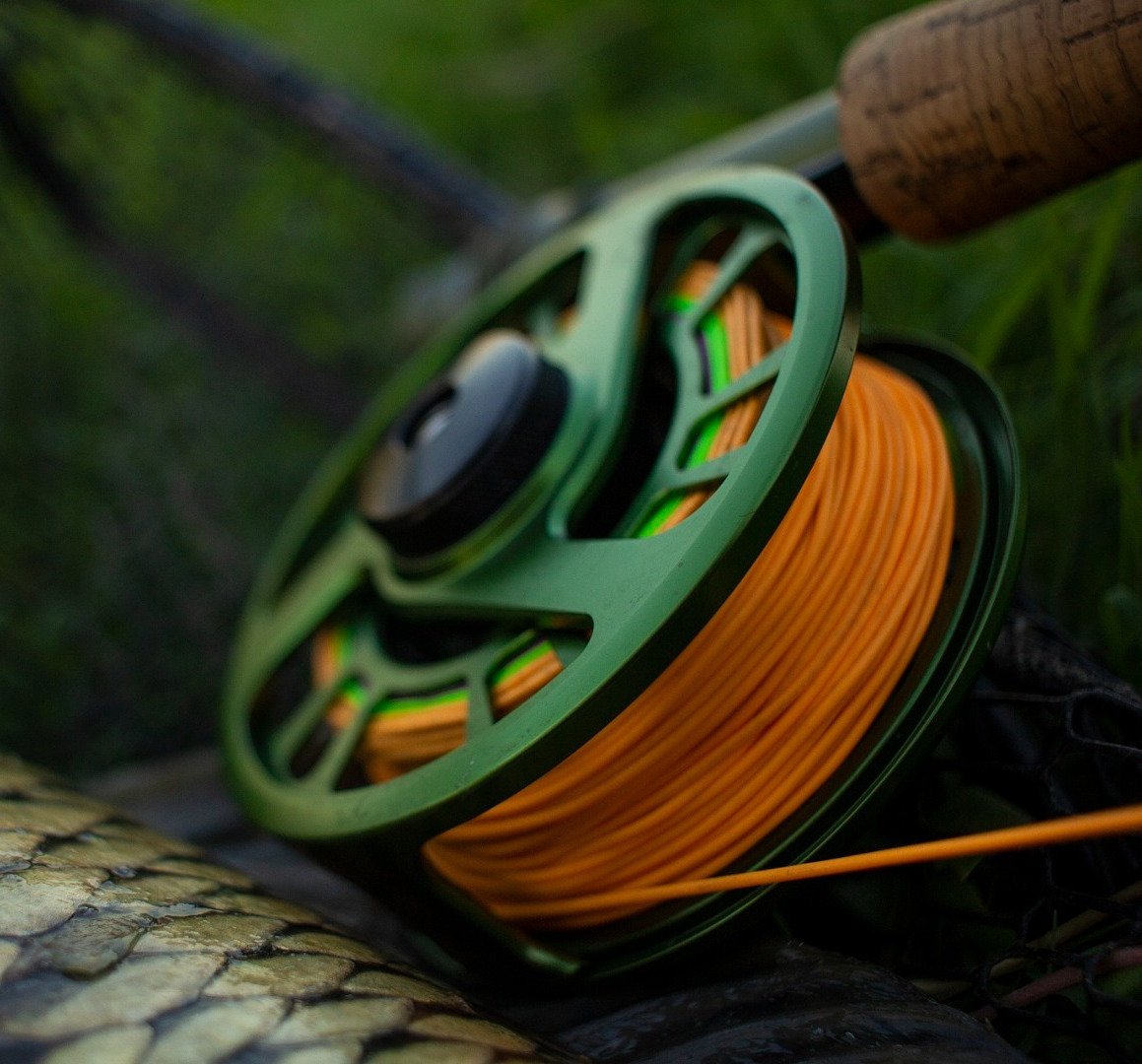 Fly reel full of yellow fly line