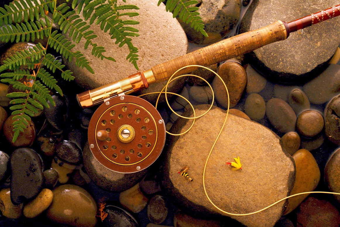 fly fishing set up on rocks