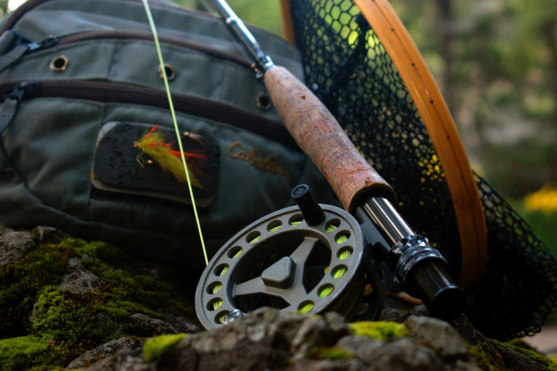 Fly rod with net and vest